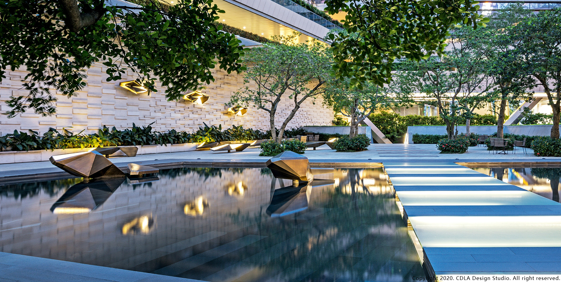 The installation is to celebrate abundant fortune and happiness in life. The abstracted fish sculptures are composed with two parts, body and tail, which could be arranged and rearranged to continually, create unlimited dynamic forms.